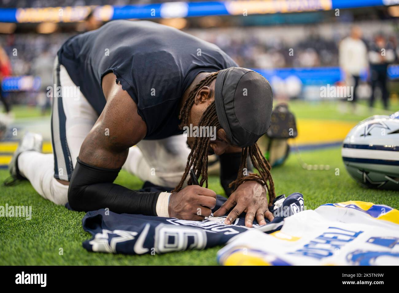 Dallas Cowboys safety Donovan Wilson (6) signs his jersey after an NFL game against the Los Angeles Rams, Sunday, October 9, 2022, at SoFi Stadium, in Stock Photo