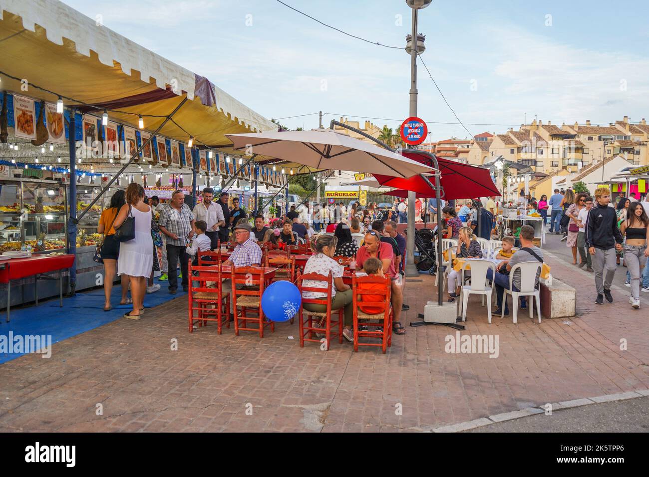 Food stand meat,  terrace, at annual celebration of the festive Feria in Fuengirola, Costa del Sol, Spain. Stock Photo