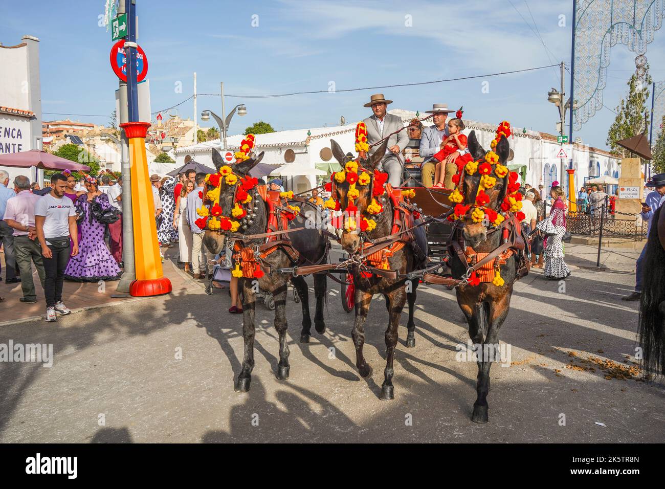 Horse carriage with drivers and family, at the annual fair, Feria of