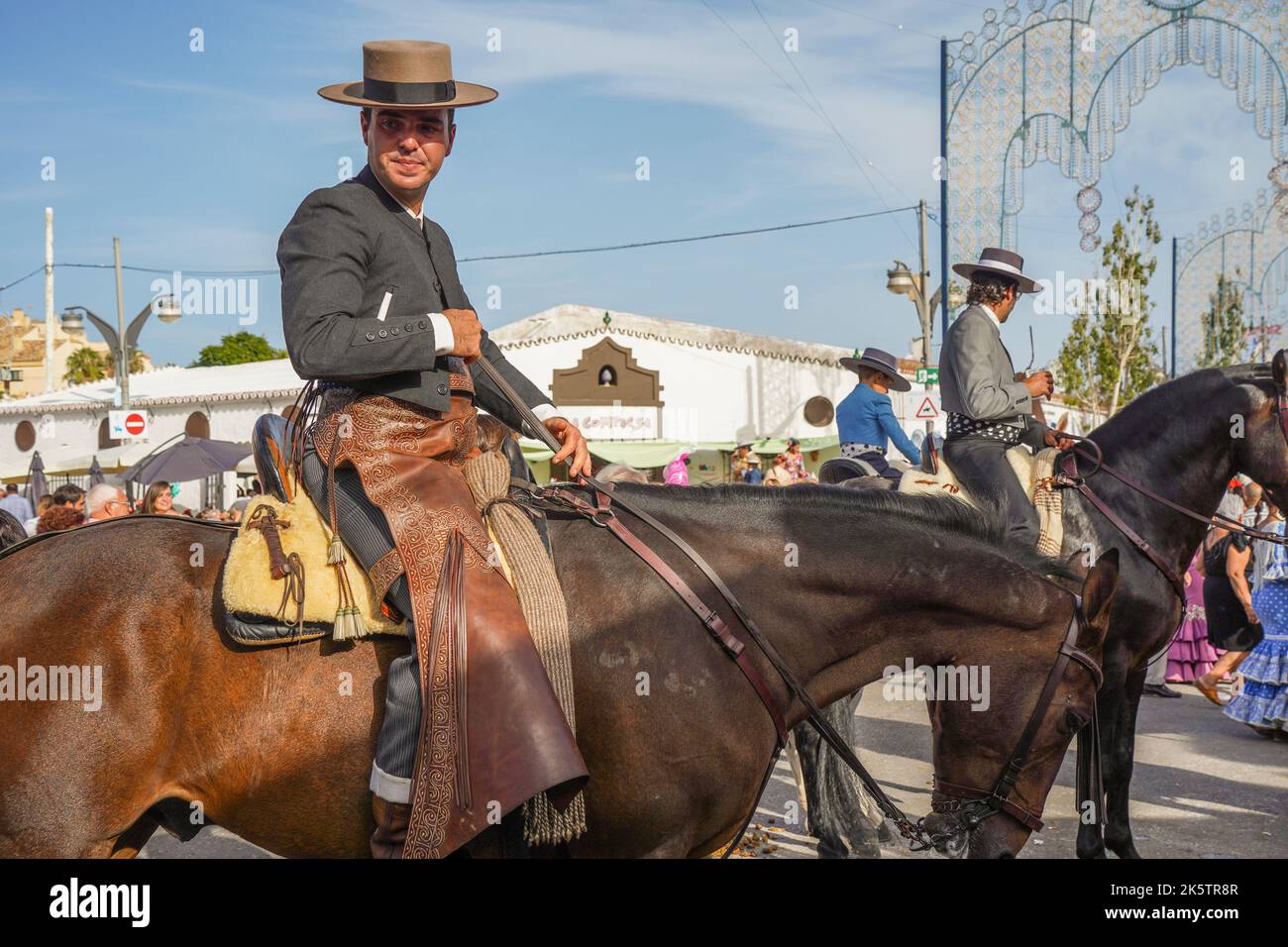 Spanish horsemen, during annual Fair, Feria. Fuengirola, Andalusia. Stock Photo