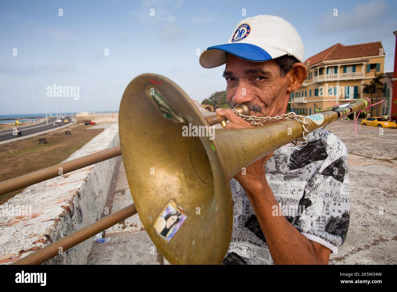 Colombia, Cartagena, making music on the old fortress wall overlooking the caribean sea. Stock Photo