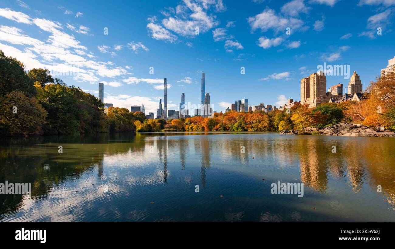 Central Park in Autumn with Billionaires' Row skyscrapers from the Lake. Upper West Side, Manhattan, New York City Stock Photo