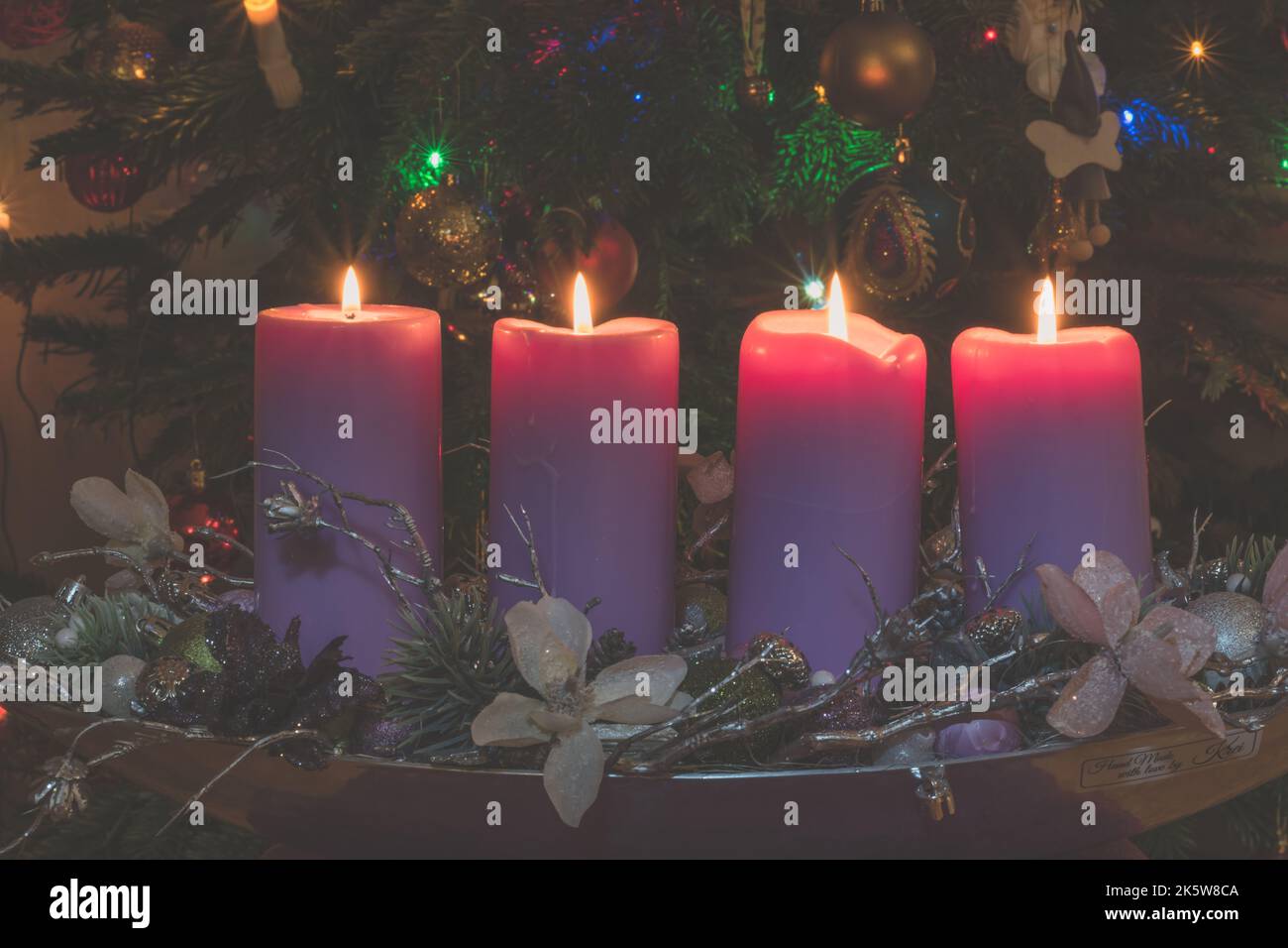 purple advent candles on christmas background Stock Photo Alamy