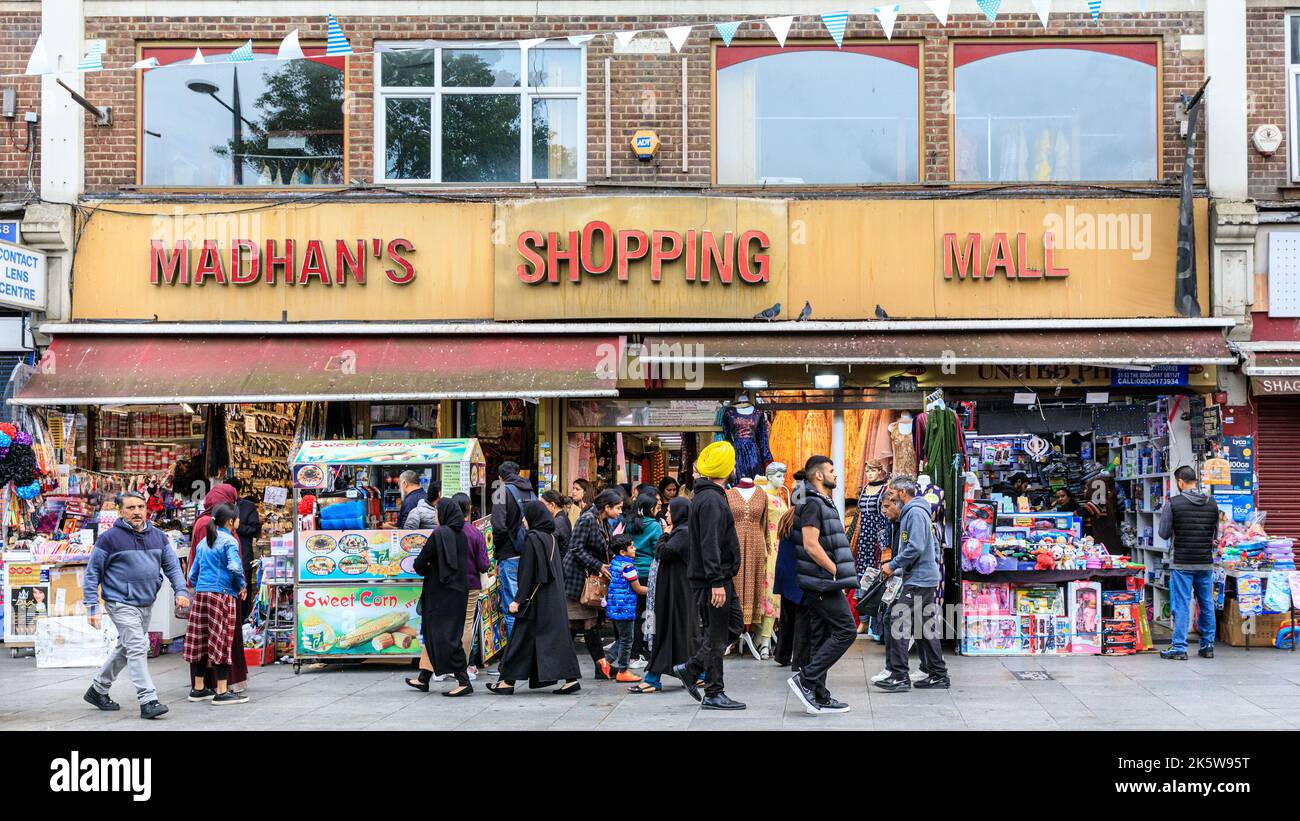Madhan's Shopping Mall stores, Asian shops and people shopping in Southall High Street, Southall, West London, England, UK Stock Photo