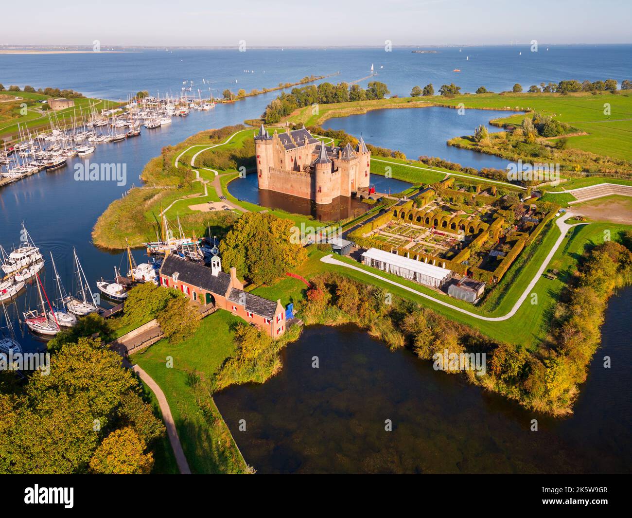 Drone Point of View on Muiderslot Castle in Muiden, North-Holland, Netherlands on sunny autumn day. The Castle dates from the late 14th Century. Stock Photo