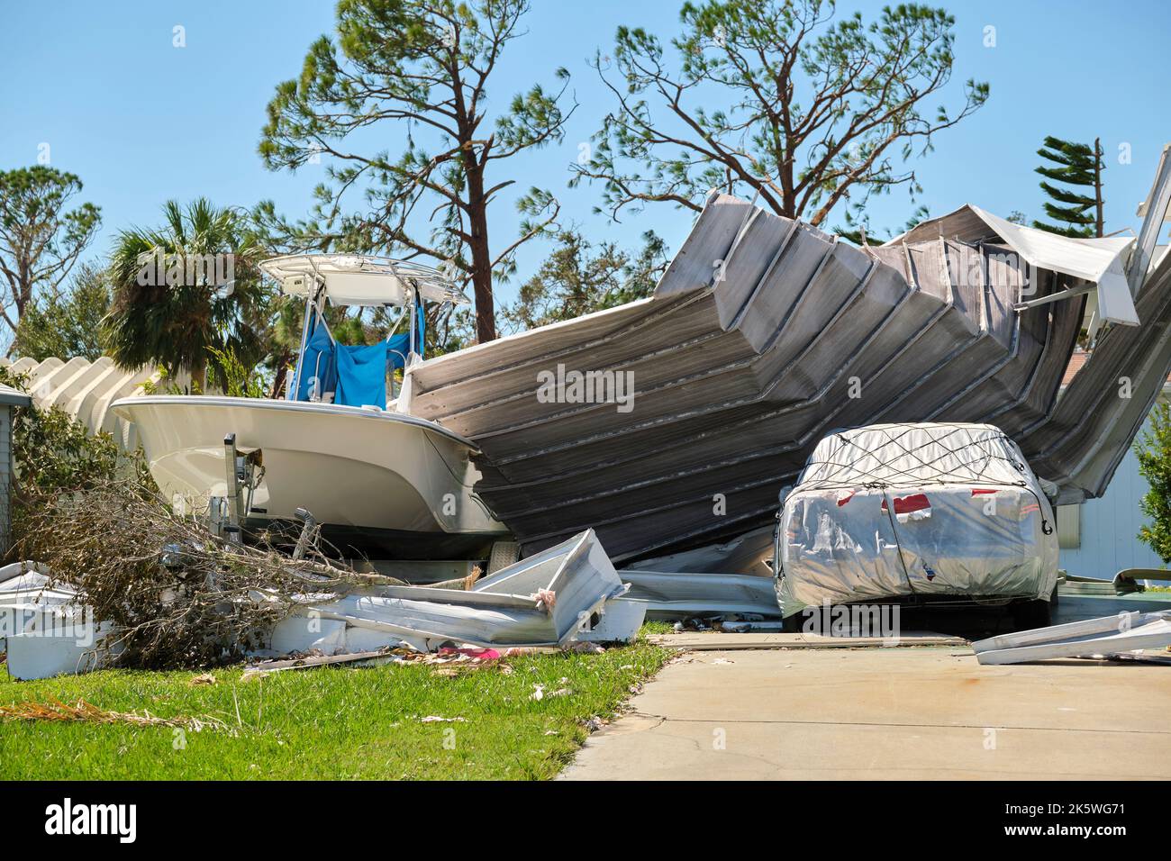 Severely damaged by hurricane Ian house and vehicle in Florida mobile