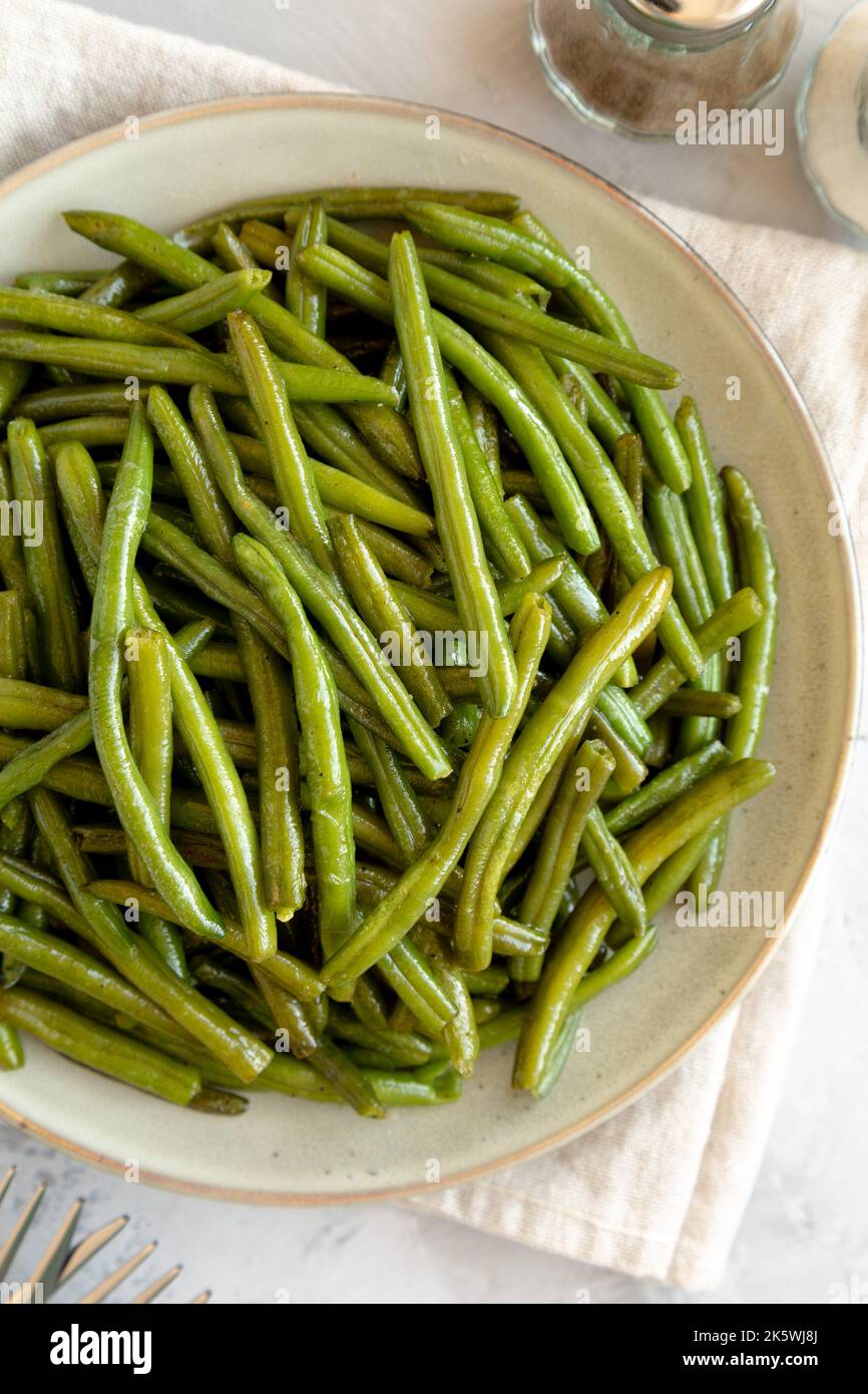 Homemade Sauteed Green Beans on a Plate, top view. Flat lay, overhead ...