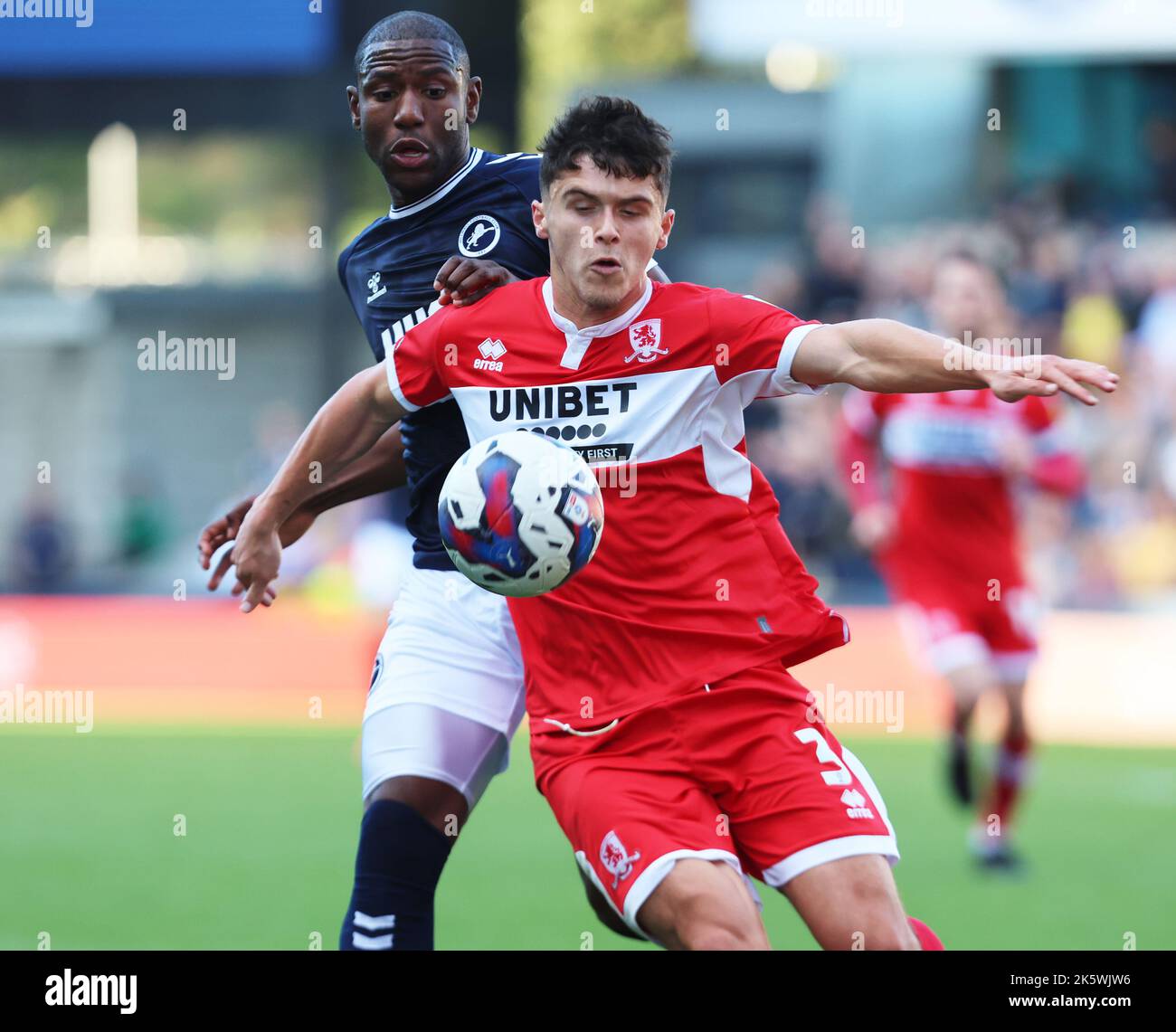 LONDON ENGLAND - OCTOBER  08 : Ryan Giles of Middlesbrough hold of Benik Afobe of Millwall during Championship match between Millwall against Middlesb Stock Photo