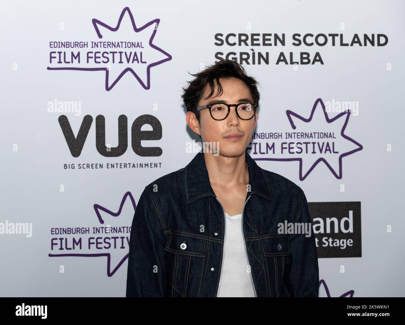 Actor Justin H Min at European premiere of After Yang, Edinburgh International Film Festival 2022 red carpet event Stock Photo