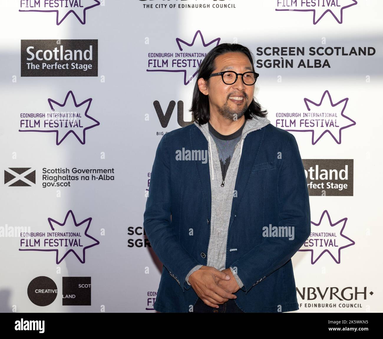 Director Kogonada at European premiere of After Yang, Edinburgh International Film Festival 2022 red carpet event Stock Photo