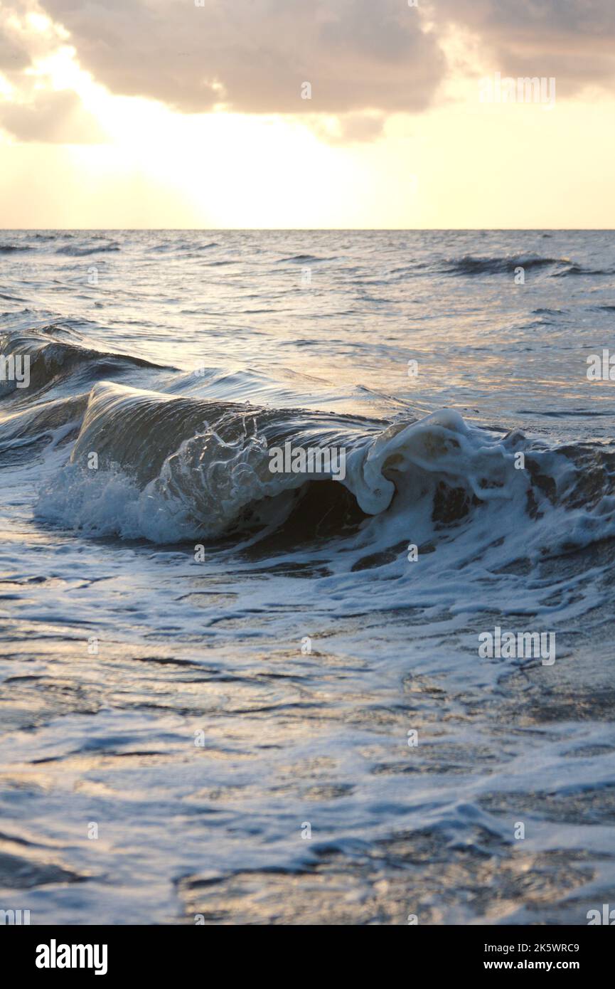 Beach sunset ocean waves texas hi-res stock photography and images - Alamy