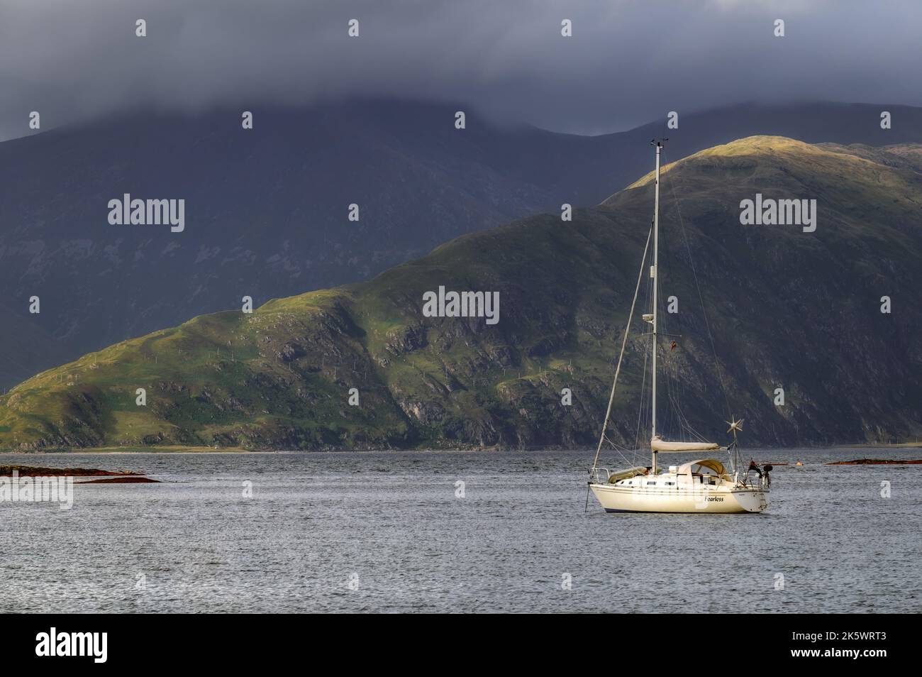 Yacht moored at Port Ramsay on the Isle of Lismore, Argyll, Scotland