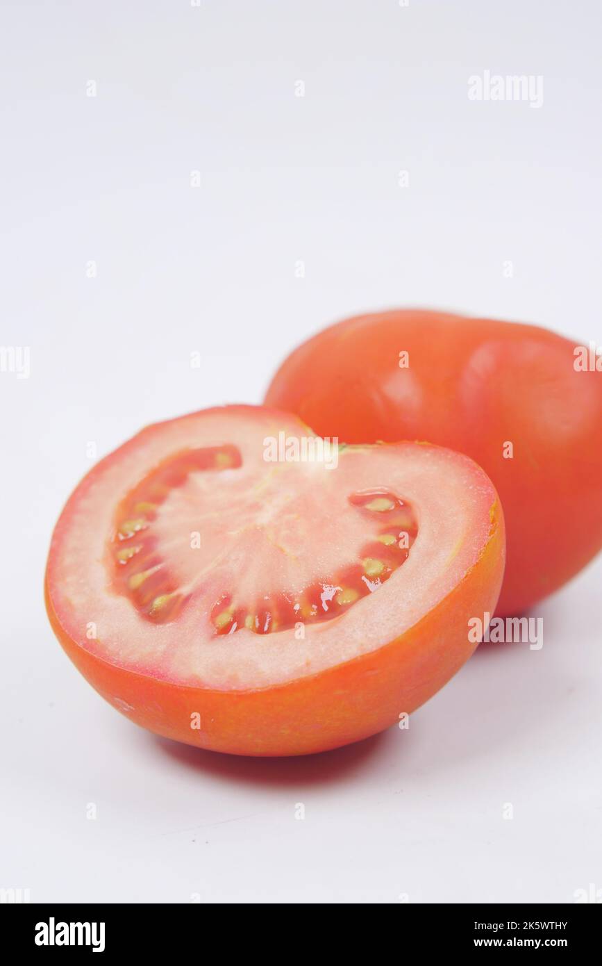 fresh tomato with water drop isolated on white  Stock Photo
