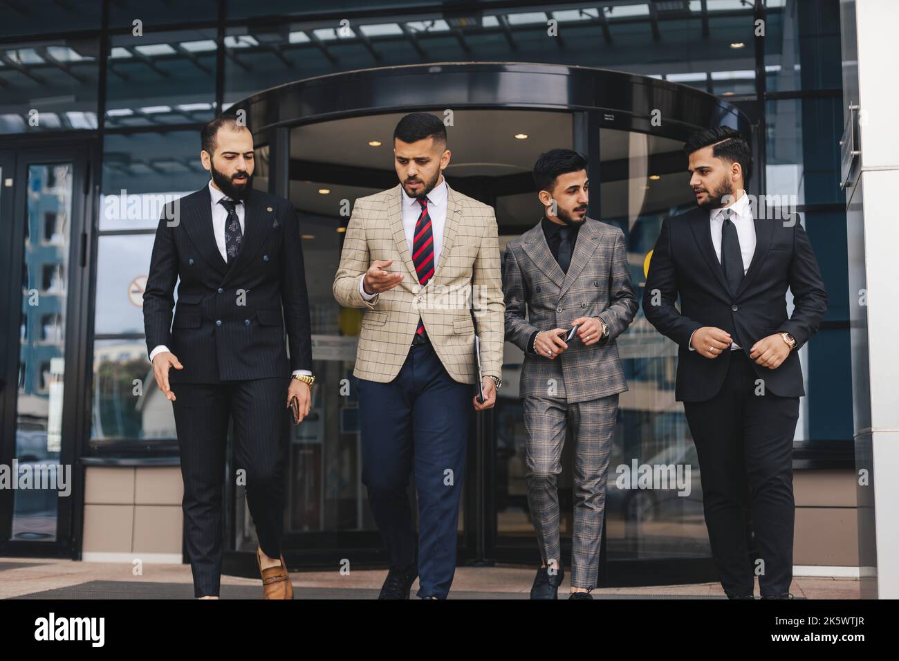 Group men walking suits hi-res stock photography and images - Alamy