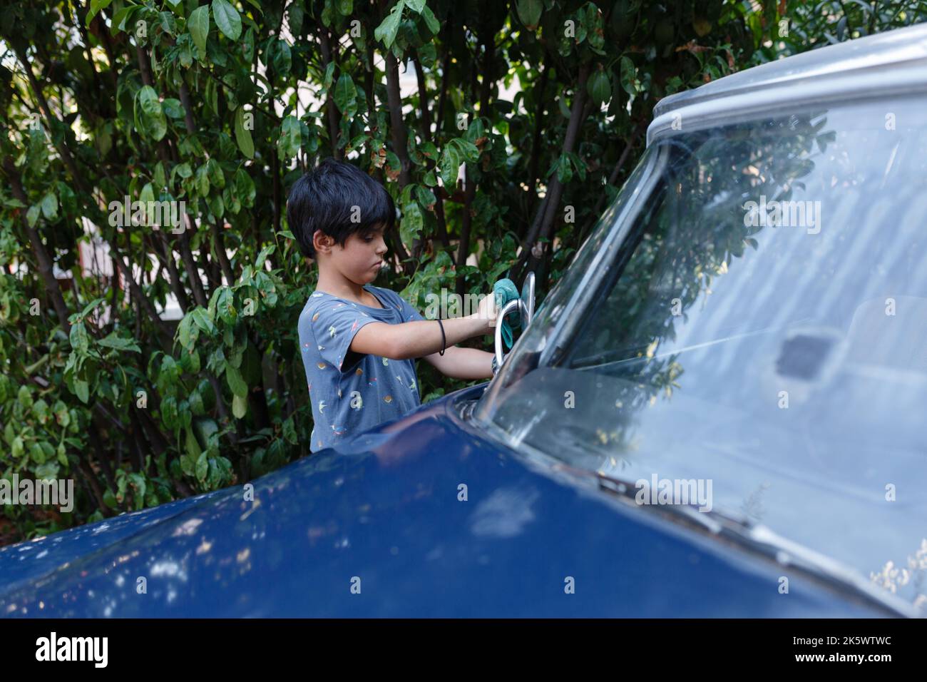 Black child washing car hi-res stock photography and images - Alamy