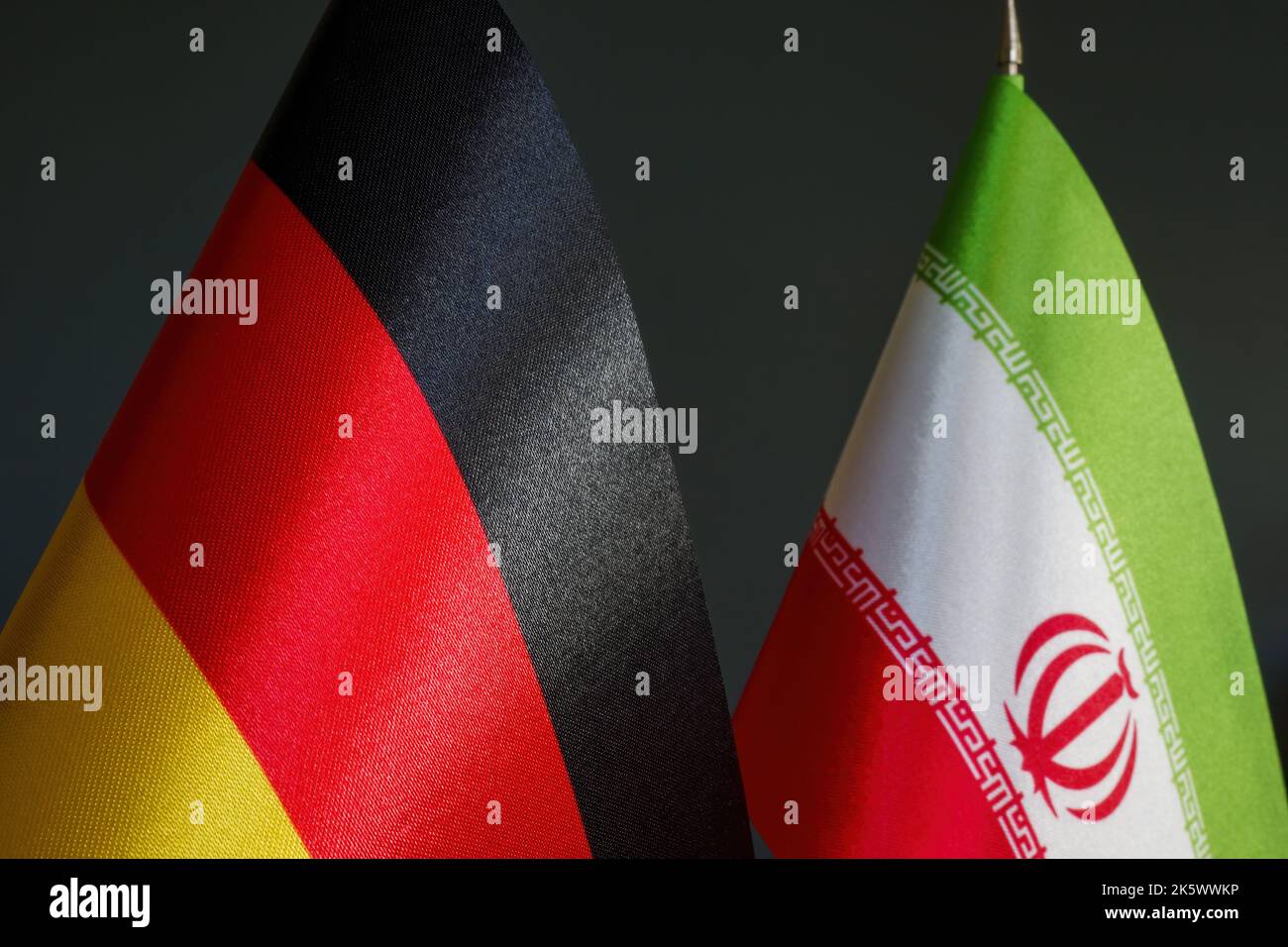 Flags of Germany and Iran as a concept of negotiations. Stock Photo