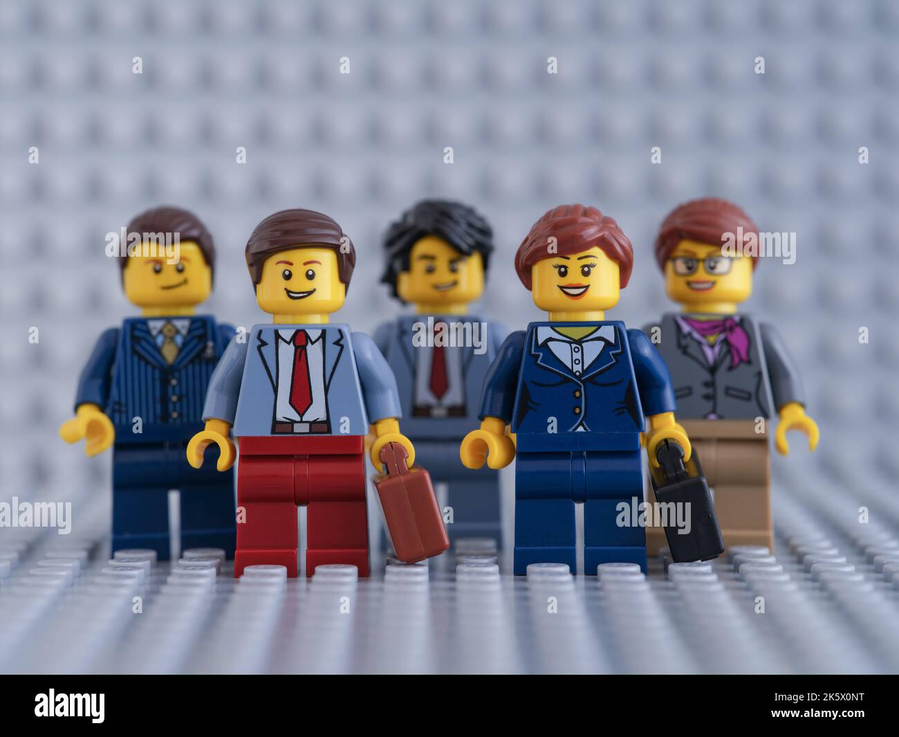 Tambov, Russian Federation - October 09, 2022 Lego businessperson minifigures standing and looking into their successful future. Stock Photo