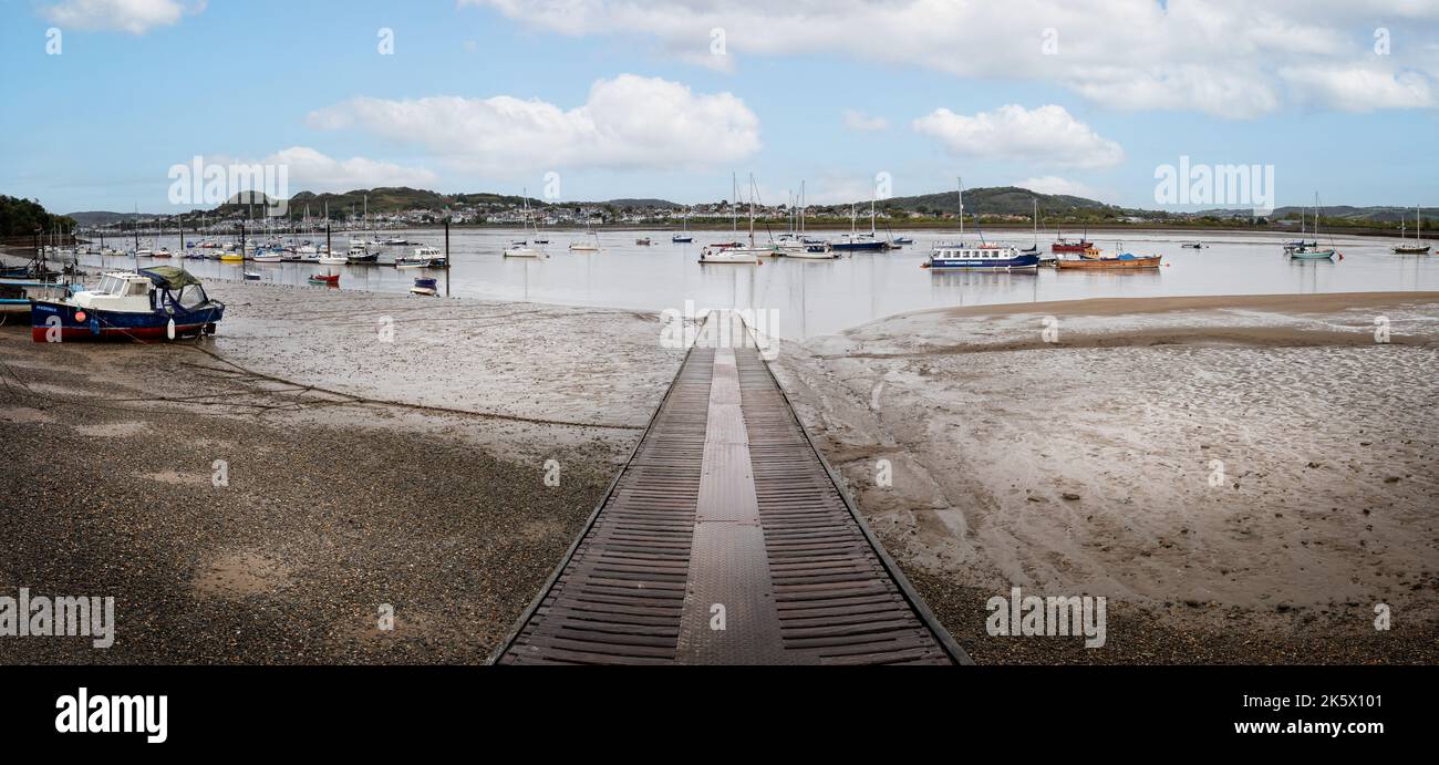 Panoramic view of wooden slip way leading into the River Conwy at Conwy, Gwnydd, North Wales on 5 October 2022 Stock Photo