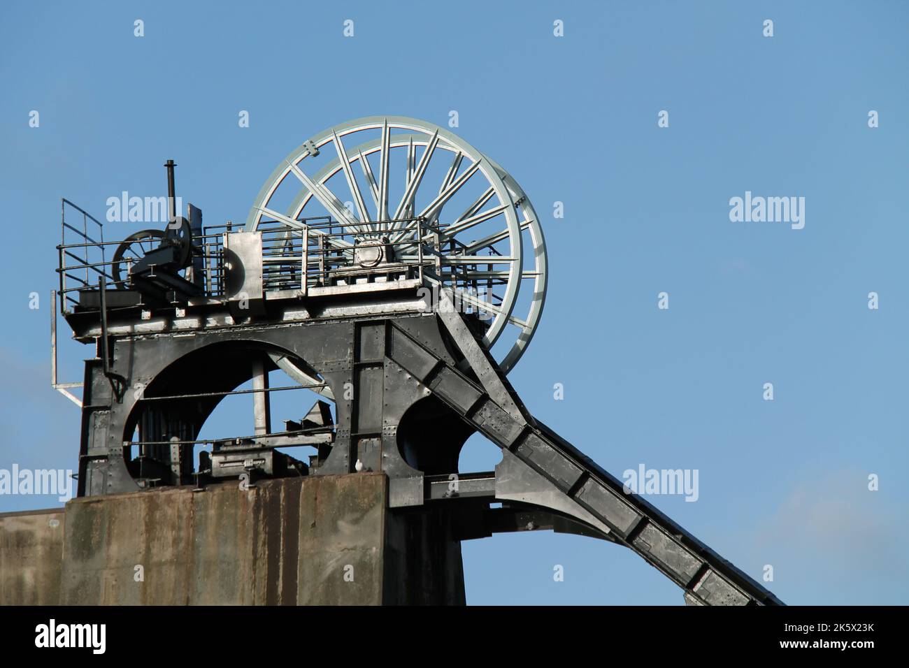 The Winding Wheels of a Disused Coal Mine. Stock Photo