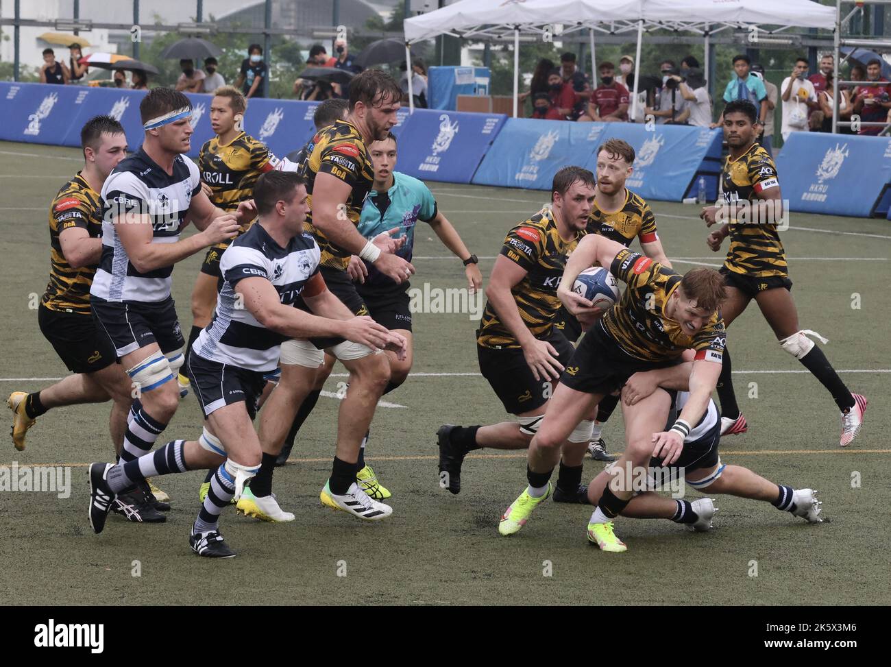 Sam Purvis Super Saturday Rugby between HKFC (white and blue stripes) and USRC ...
