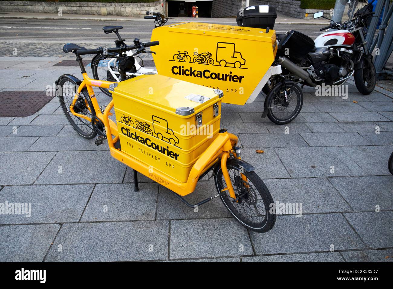 clickacourier mobile cycle couriers bikes parked in the financial district of dublin docklands dublin republic of ireland Stock Photo