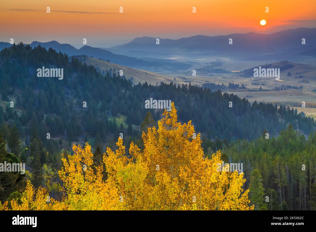 autumn sunrise over the tenmile creek valley below macdonald pass near ...