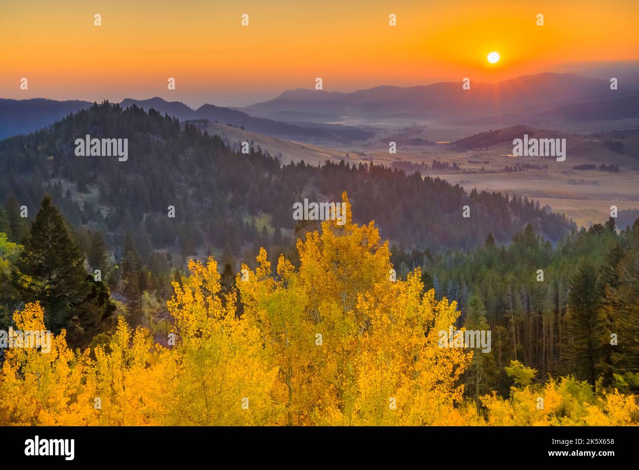 autumn sunrise over the tenmile creek valley below macdonald pass near ...