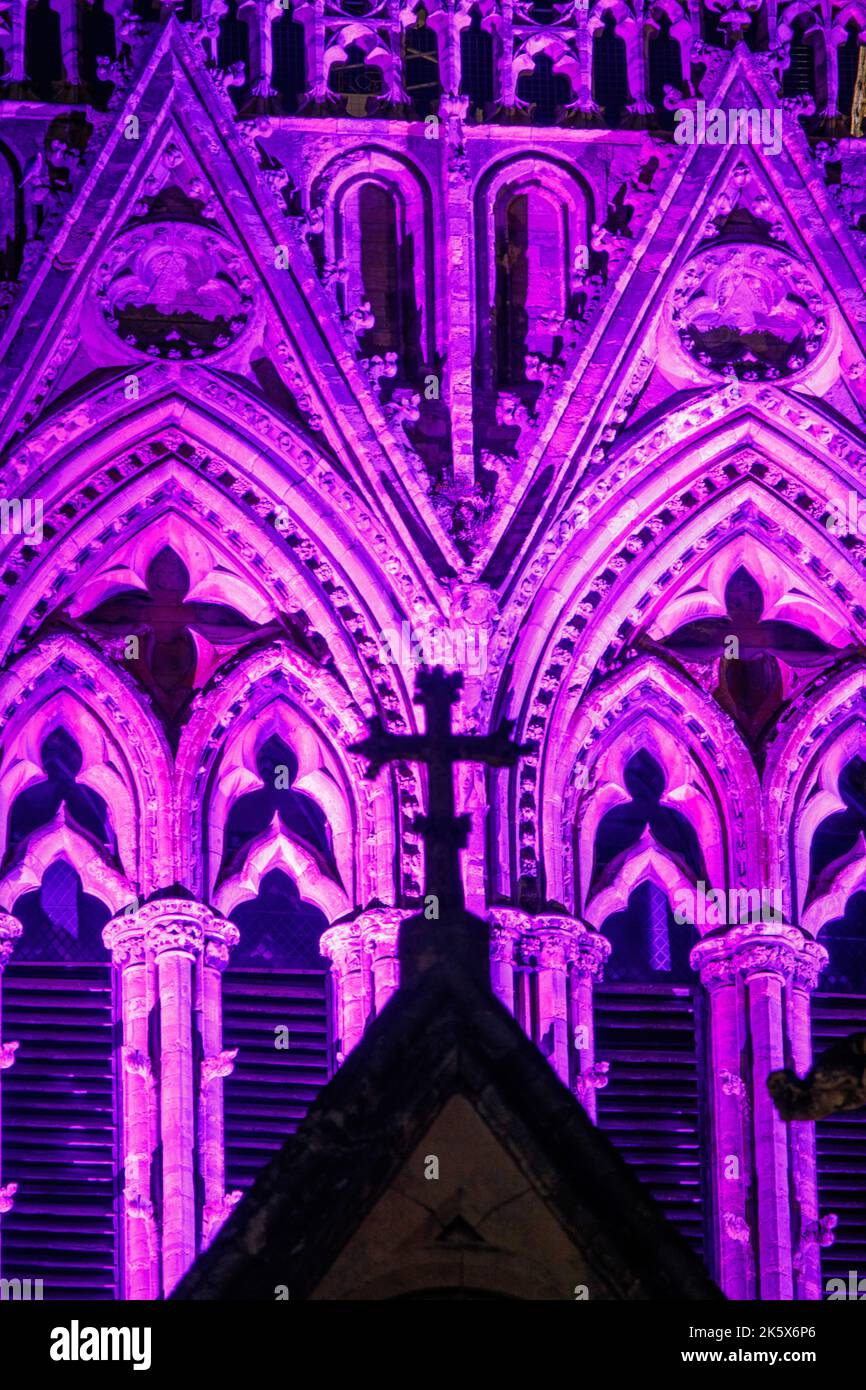 Lincoln Cathedral lit purple to mark Robert Grosseteste day, and celebrate the 160th anniversary of Bishop Grosseteste University Stock Photo