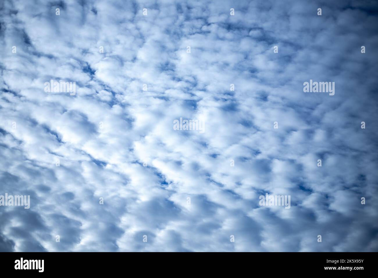 Blue sky background and white clouds soft focus. Stock Photo