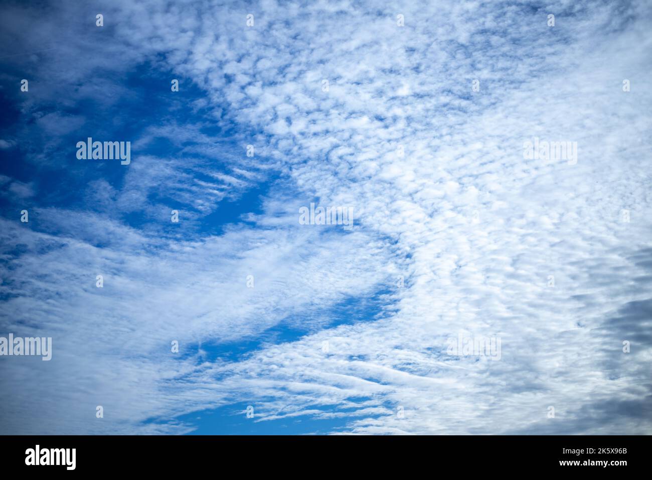 Blue sky background and white clouds soft focus. Stock Photo