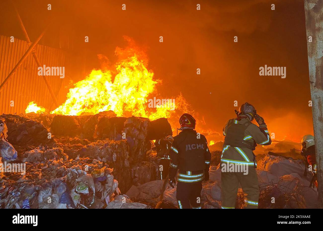 Kyiv, Ukraine. 10th Oct, 2022. Firefighters of the State Emergency Service (DSNS) work to put out the fire which erupted in a warehouse after several explosions hit Kyiv, Ukraine on October 10, 2022. At least five people have been killed and 12 wounded in Russian missile strikes on the Ukrainian capital Kyiv, police has said. Photo by State Emergency Service of Ukraine /UPI Credit: UPI/Alamy Live News Stock Photo
