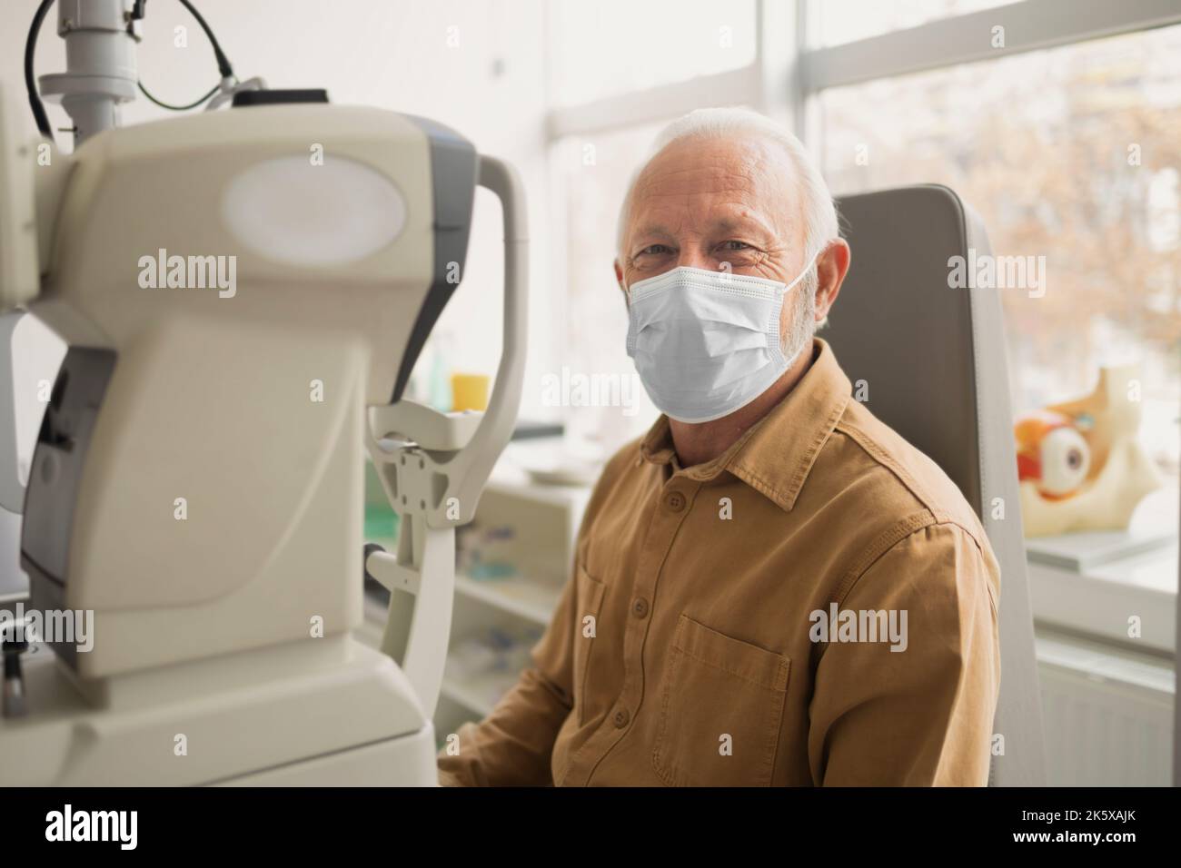 Older man having professional medic care Stock Photo