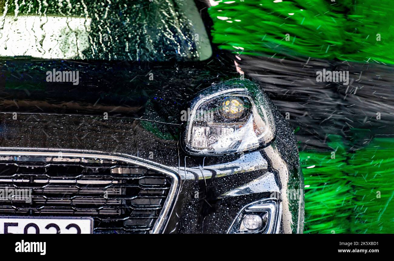 A vehicle in an automatic car wash Stock Photo Alamy