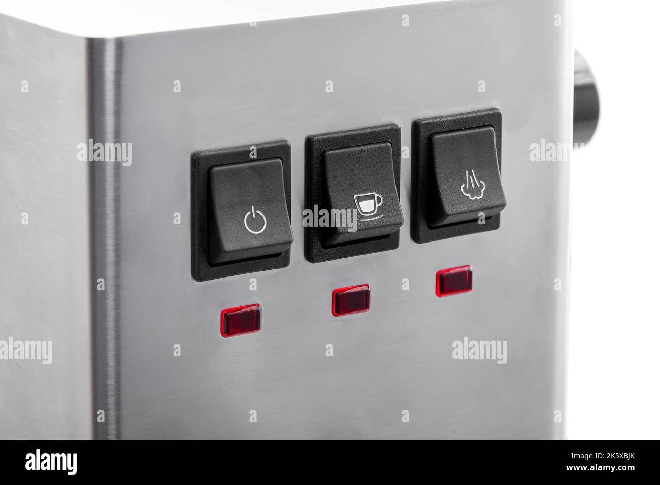 Black buttons for control making coffee with white icons, closeup of