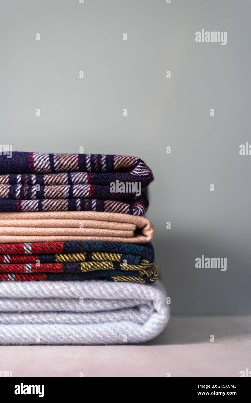 Stack of woolen checked blankets Stock Photo