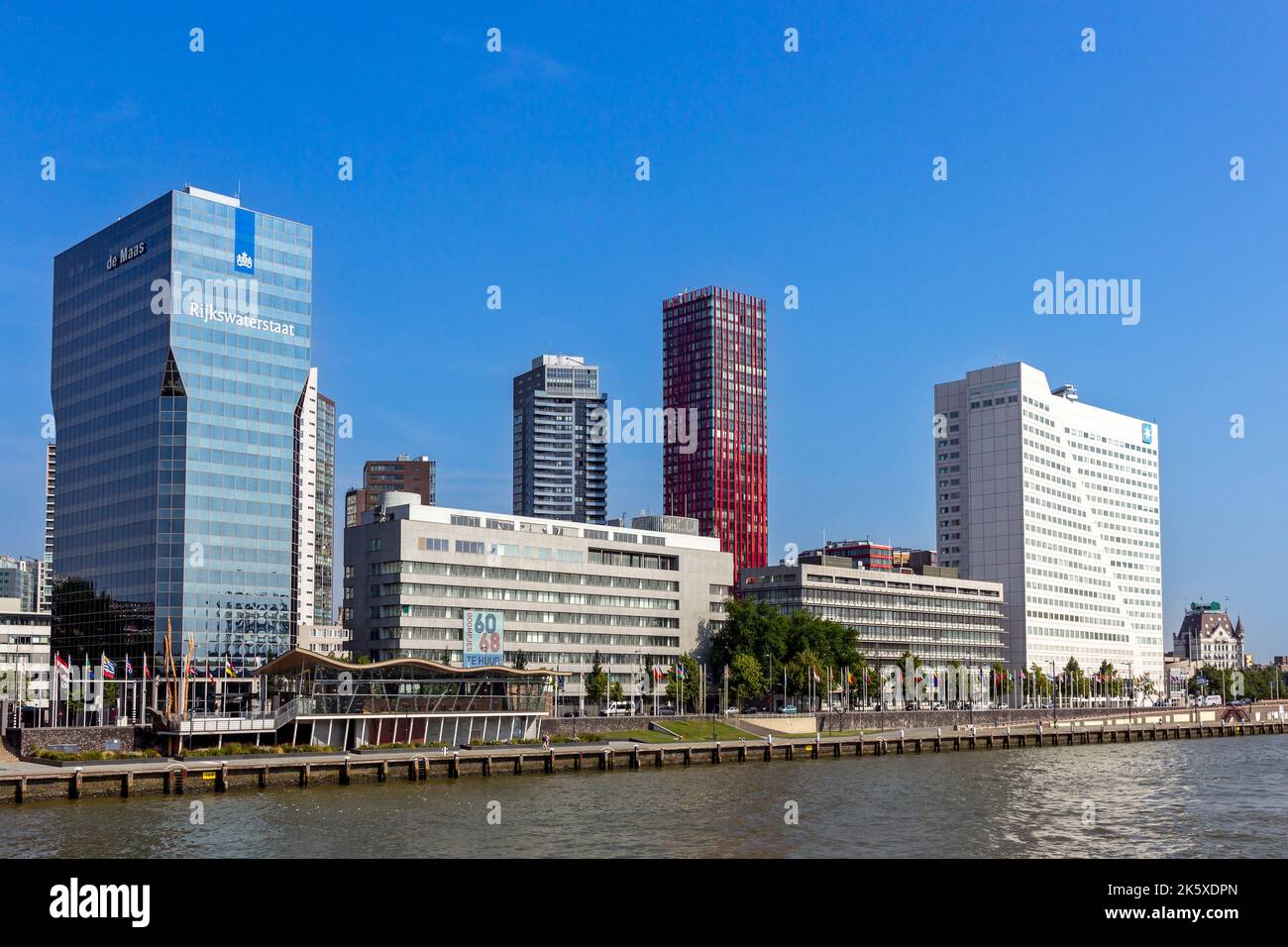 Skyscrapers in Rotterdam, with the Rijskwaterstaat building, along the Nieuwe Maas in Rotterdam, The Netherlands - August 1, 2014 Stock Photo