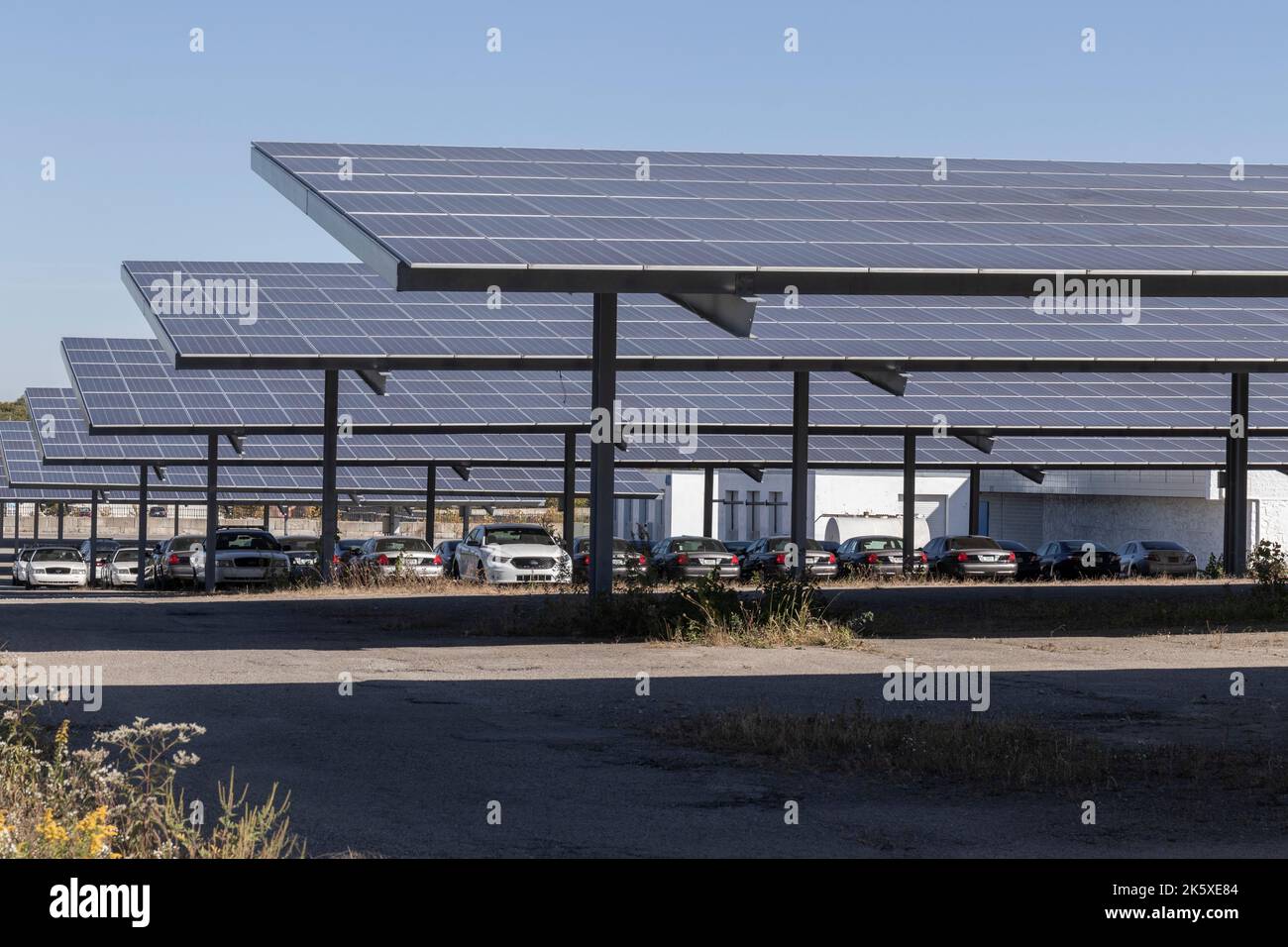 Indianapolis - Circa October 2022: Solar Thermal Flat Panels in a parking lot. Companies are installing renewable energy sources to reduce their carbo Stock Photo