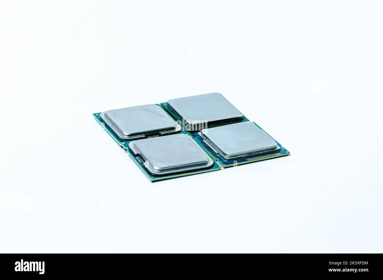 Computer processor CPU  Central processing unit microchip  isolated on white background Closeup  the bottom side, socket contact for personal computer Stock Photo