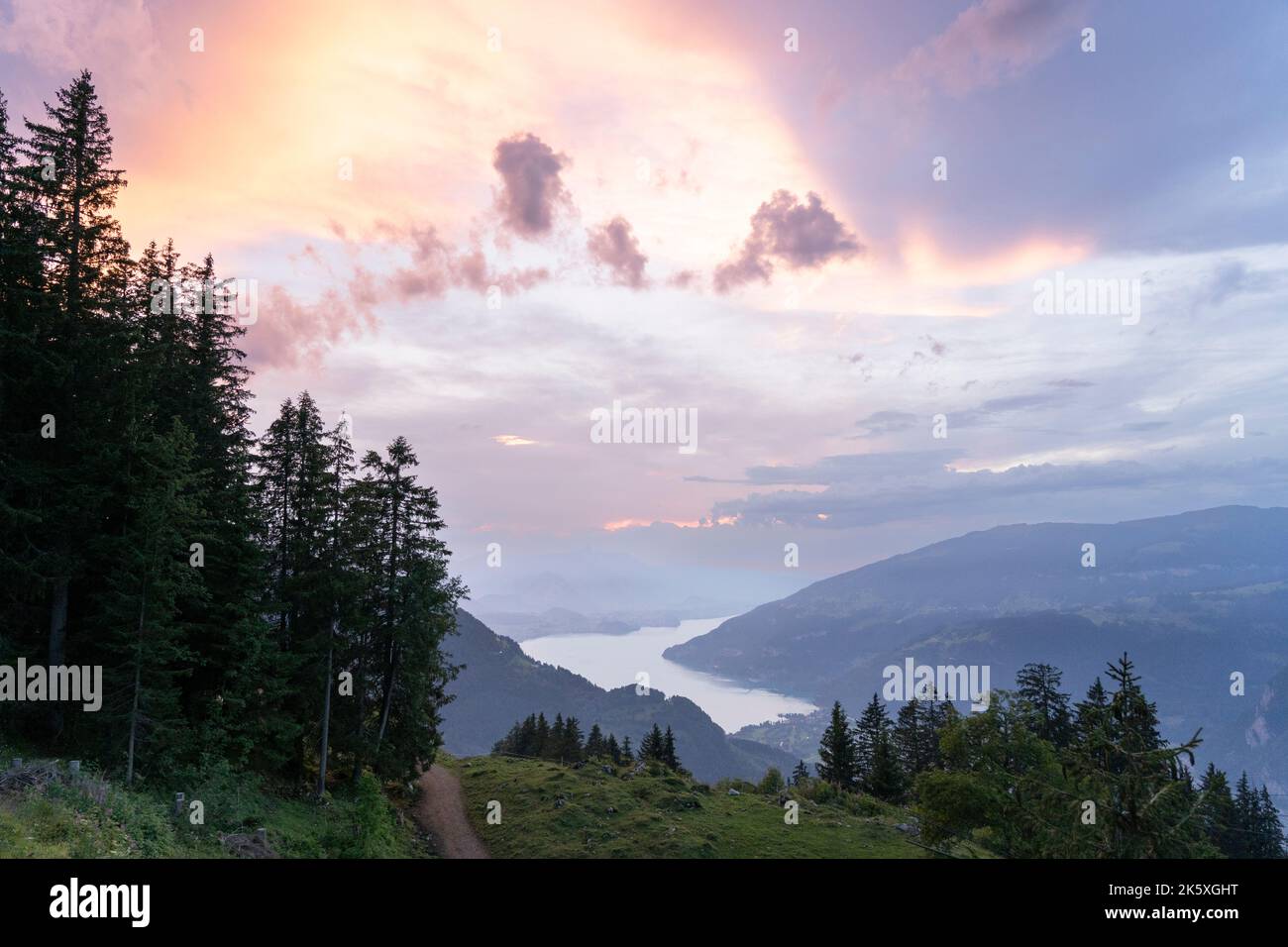 Dramatic, romantic and rare peaceful view over the UNESCO site of Lavaux, Lutry, Switzerland with the Swiss Alps Mountains in background, Stock Photo