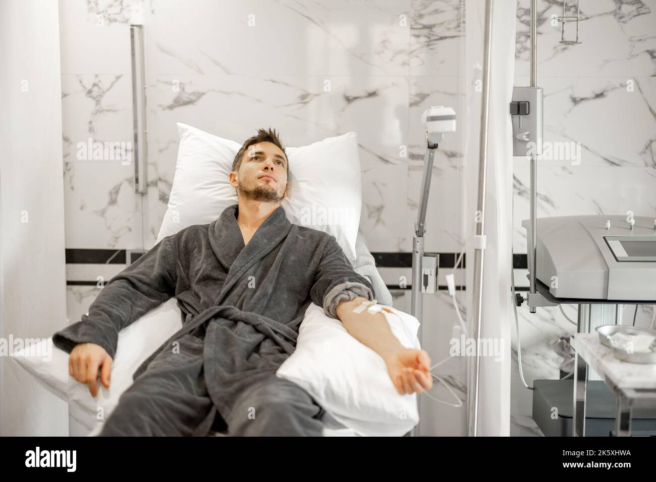 Man during blood wash procedure at medical centre Stock Photo Alamy