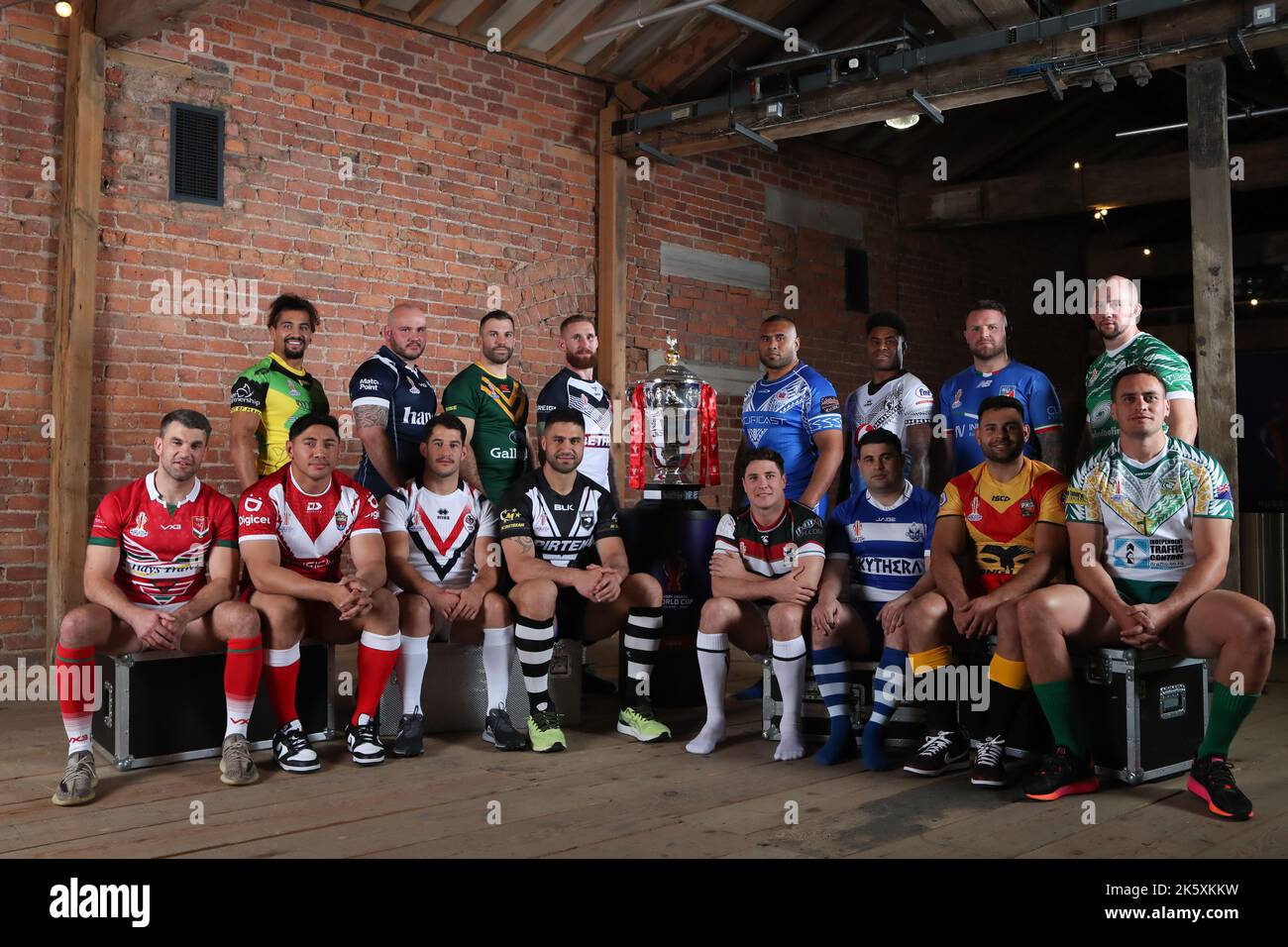 Science and Industry Museum, Liverpool Road, Manchester, 10th October 2022. Rugby League World Cup 2021 Tournament Launch (Back Row L-R) Ashton Golding of Jamaica, Dale Ferguson of Scotland, James Tedesco of Australia, Sam Tomkins of England, Junior Paulo of Samoa, Kevin Naiqama of Fiji, Nathan Brown of Italy, George King of Ireland (Front Row L-R) Elliot Kear of Wales, Jason Taumalolo of Tonga, Benjamin Garcia of France, Jesse Bromwich of New Zealand, Mitchell Moses of Lebanon, Jordan Meads of Greece, Rhyse Martin of Papua New Guinea and Brad Takairangi of Cook Islands pose for a photograp Stock Photo