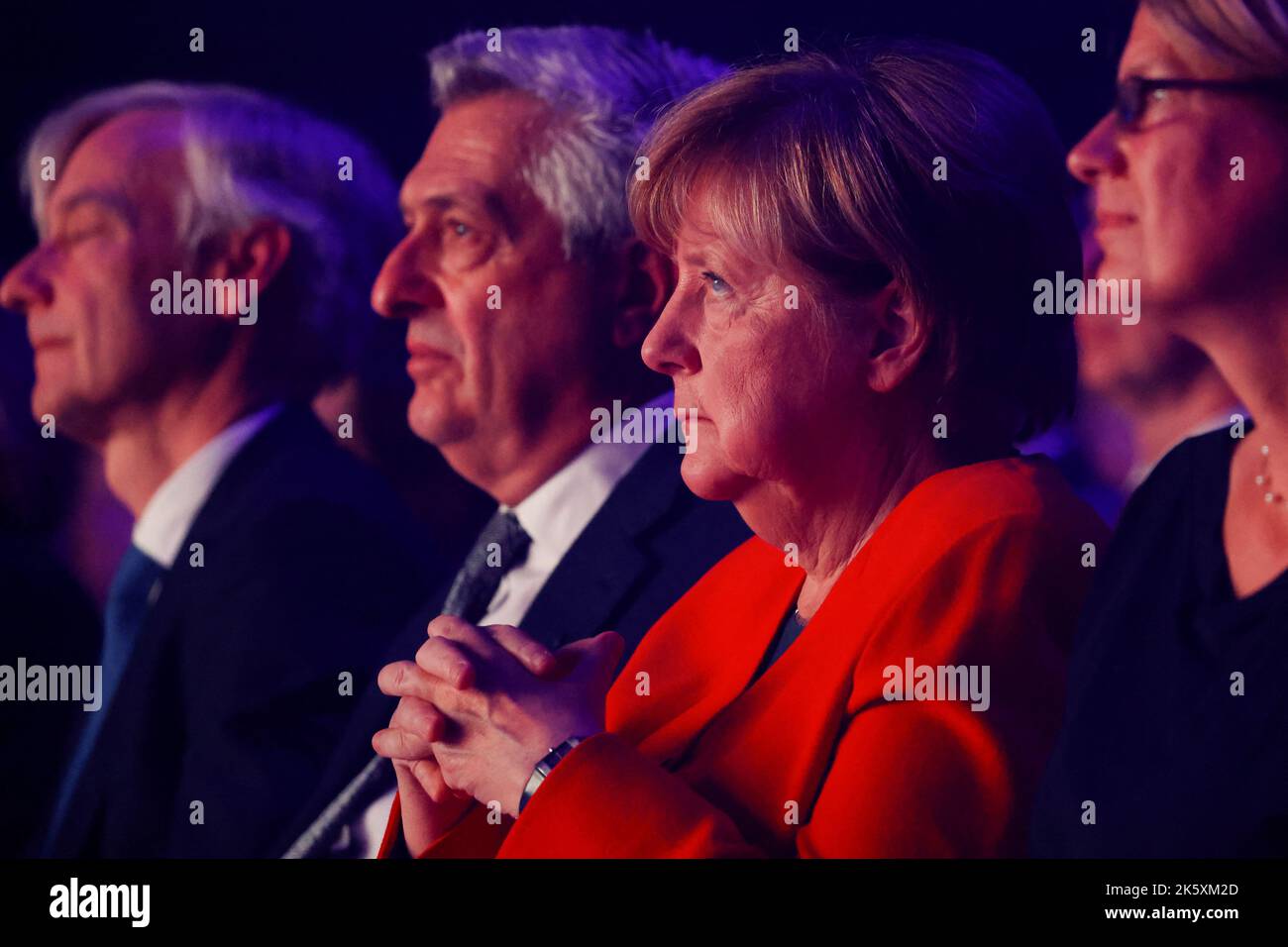Angela Merkel sits in the audience ahead of receiving the UNHCR Nansen Refugee Award for protecting refugees at height of Syria crisis, during a ceremony in Geneva, Switzerland, October 10, 2022. REUTERS/Stefan Wermuth/Pool Stock Photo