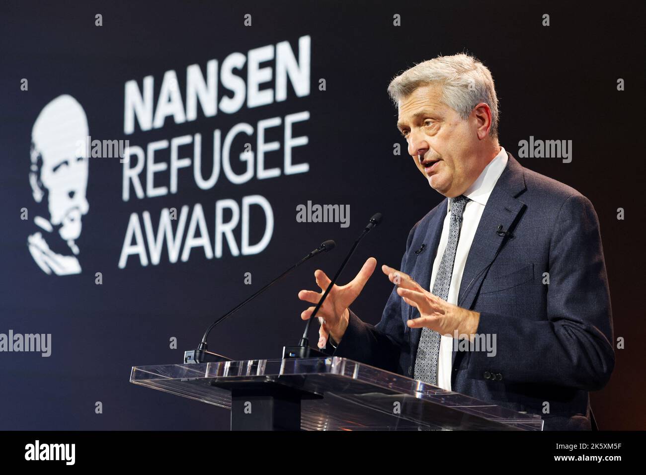 United Nations High Commissioner for Refugees Filippo Grandi speaks before Angela Merkel receives the UNHCR Nansen Refugee Award for protecting refugees at height of Syria crisis, during a ceremony in Geneva, Switzerland, October 10, 2022. REUTERS/Stefan Wermuth/Pool Stock Photo