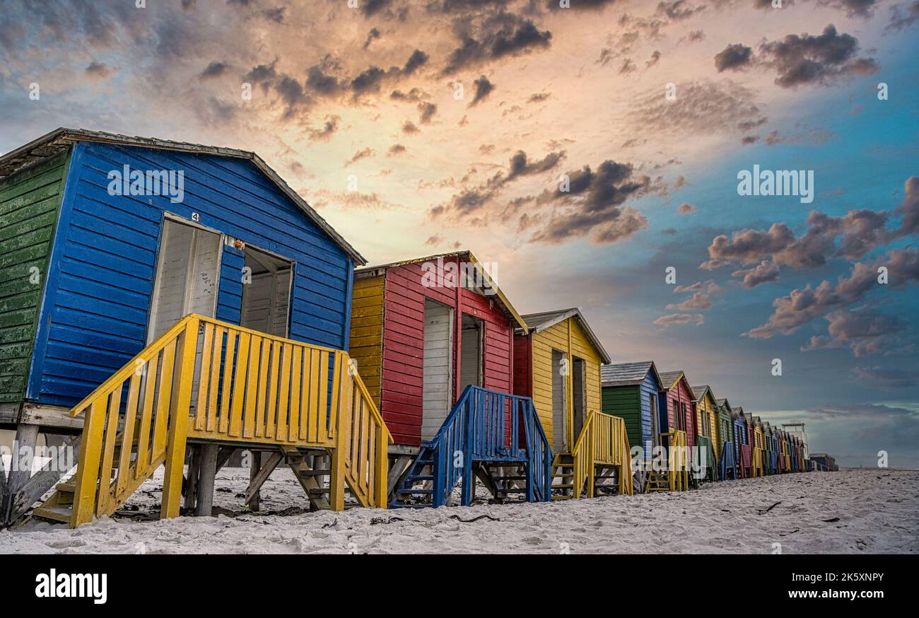 Sunset over iconic change rooms at Muizenberg, Cape Town, South Africa Stock Photo