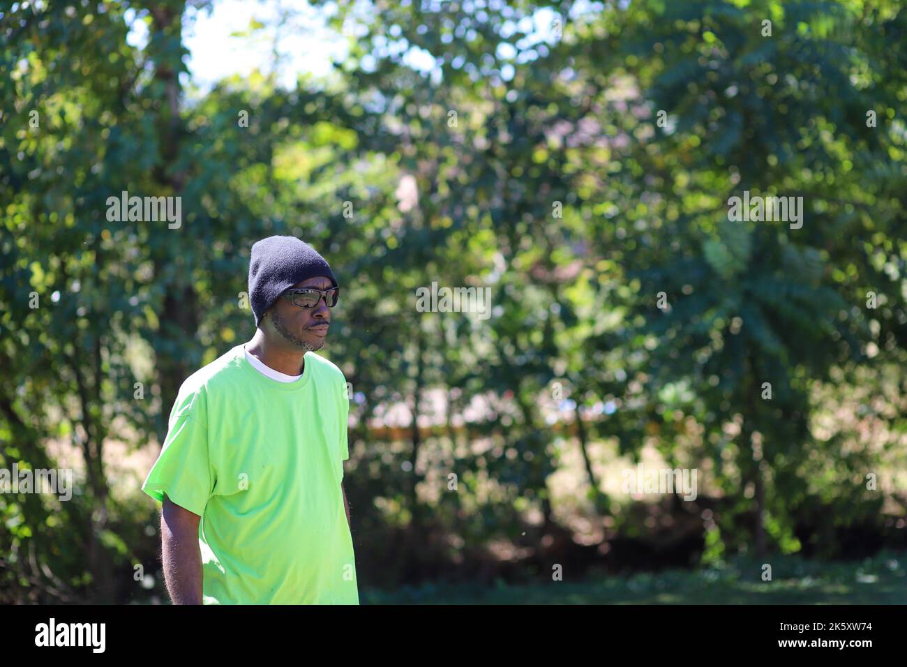 Black man walking hi-res stock photography and images - Alamy