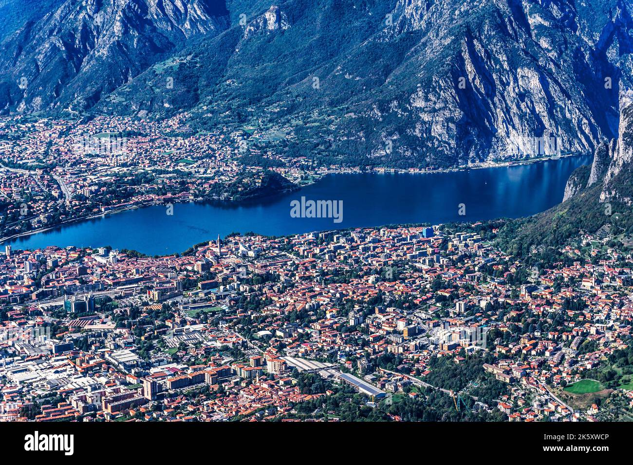 A panoramic view of Lecco, on Lake Como, Italy. Viewed from Piani D’erna 1375m above sea level. Stock Photo