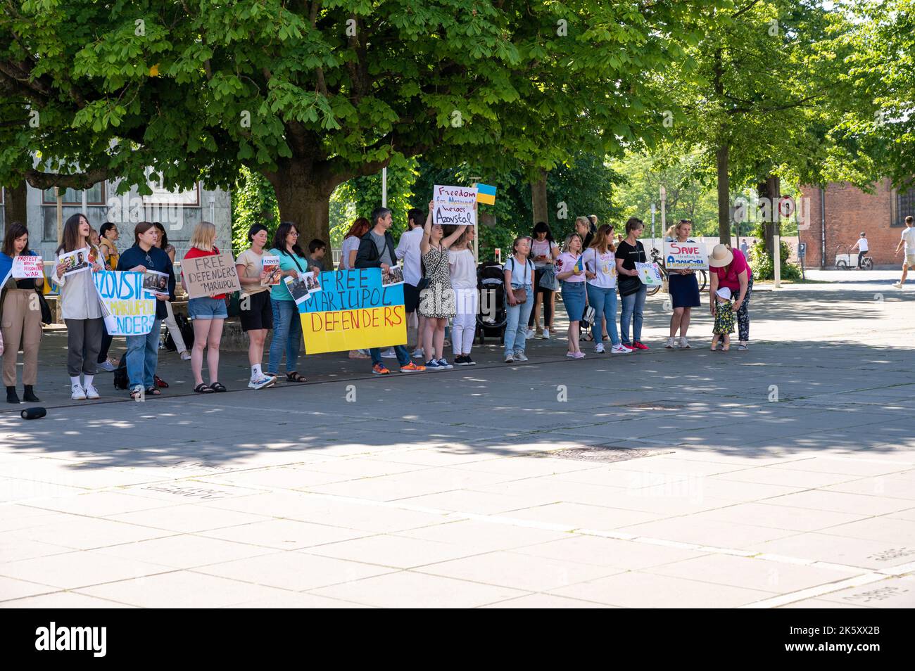 Ukrainians with banners and flags demonstraiting against the war in Aarhus, Denmark on 25 June 2022 Stock Photo