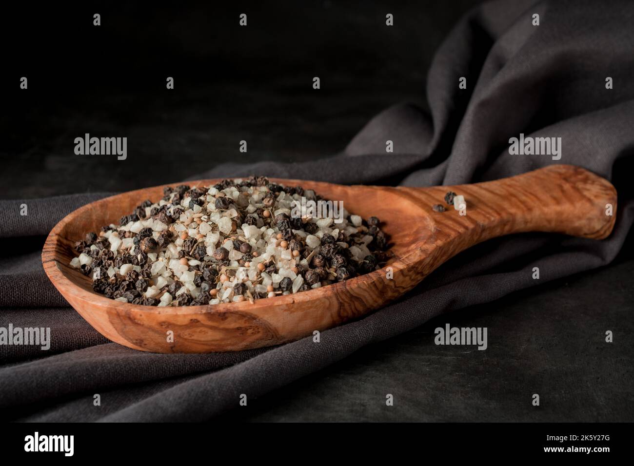 Sea salt and ground black pepper in mortar pestle Stock Photo Alamy