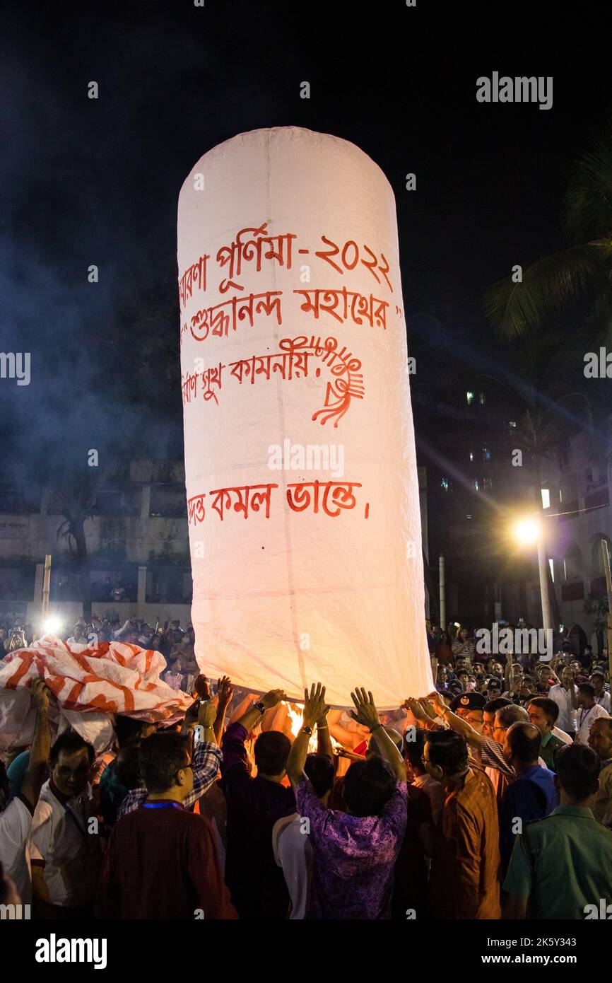Candid photography Of Lanterns Being Released During the Probarona Purnima Festival At Mukda
