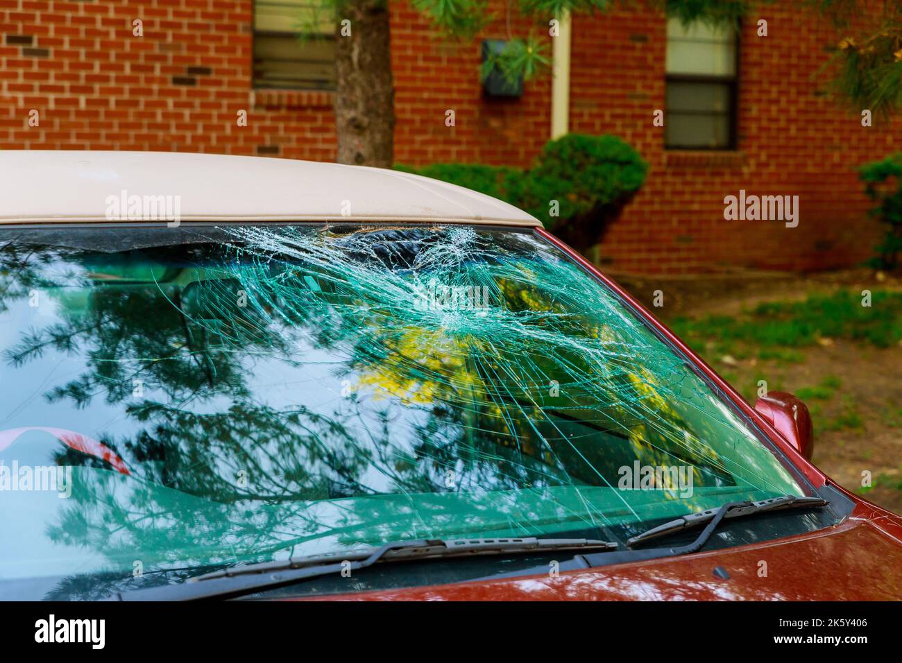 Broken window in garage hires stock photography and images Alamy